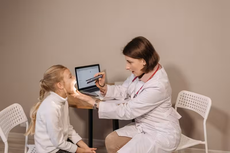 Booking Support for a Smoother Clinic Visit: A doctor in a clinic Doctor in clinic for Booking Support for a Smoother Clinic Visit - Book A Telephone Consultation At Finchley: Private Micros...