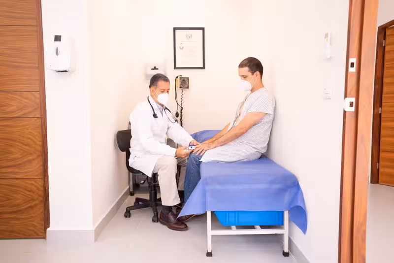 Book Your Microsuction Ear Wax Removal Appointment Today, And Say Goodbye to the Discomfort of Ear Wax.: A doctor and patien... Doctor and patient consultation for Book Your Microsuction Ear Wax Removal Appointment Today, And Say Goodbye to the Discomf...